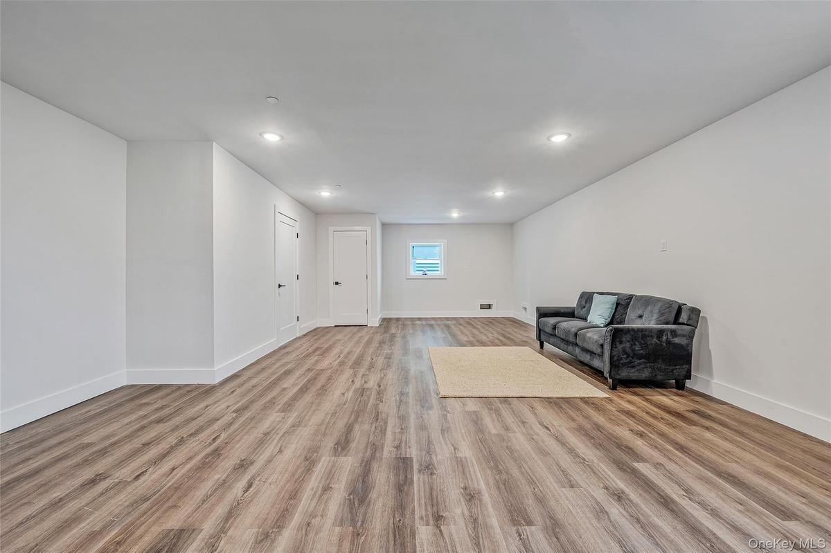 Unfurnished room featuring light wood-type flooring and recessed lighting