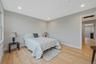 Bedroom featuring wood finished floors and recessed lighting