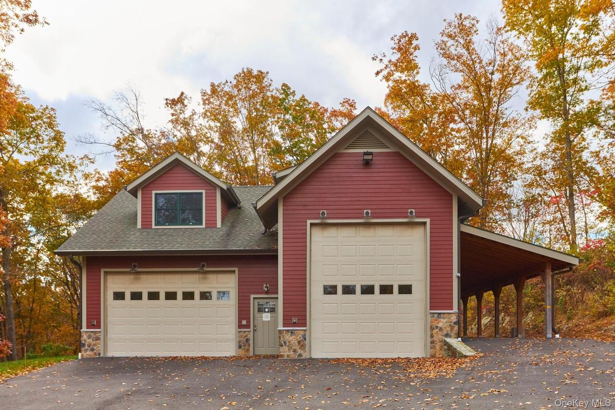 Detached 8 Car Garage with 2 Car Carport