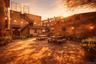 Digitally enhanced photo of the Private courtyard located between the building and the parking lot, providing a rare outdoor space with potential for 
