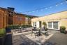 Digitally enhanced image of the rooftop, illustrating the potential for a unique outdoor business or gathering space.