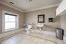 The first floor includes a handicap-accessible bathroom for convenience and accessibility.