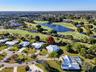 Home Backs up to Ballenisles Golf Course