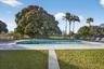 Oversized Pool with view of Ballenisles Golf Course