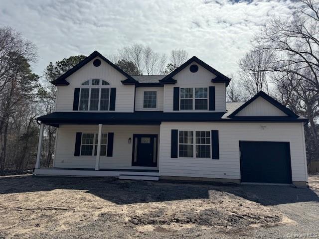 View of front of property with a porch, a garage, and driveway(option)
