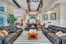 TV Room with Wood Beams and Batton Board Detail