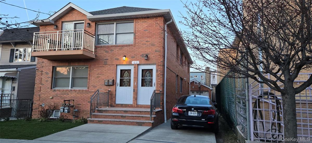 Showing two separate entrances, 1.5 car Garage and Driveway.