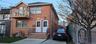 Showing two separate entrances, 1.5 car Garage and Driveway.