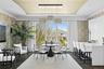 Dining room with a raised ceiling