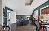 Office featuring lofted ceiling and wood finished floors