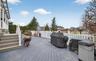 Deck with grilling area and a residential view