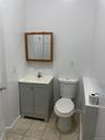 Bathroom featuring vanity and light tile patterned floors