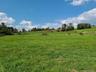 View of yard with a rural view