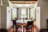 Dining room with wood-type flooring and plenty of natural light