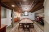 Dining room with wood ceiling and recessed lighting