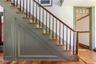 Stairway with hardwood / wood-style flooring