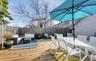 Wooden terrace with an outdoor living space