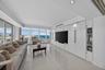 Wall Unit In Family Room With Two Hidden Single Size Murphy Beds