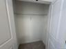 Additional closet in primary bedroom
