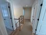 Second floor hallway with access to 4 bedrooms