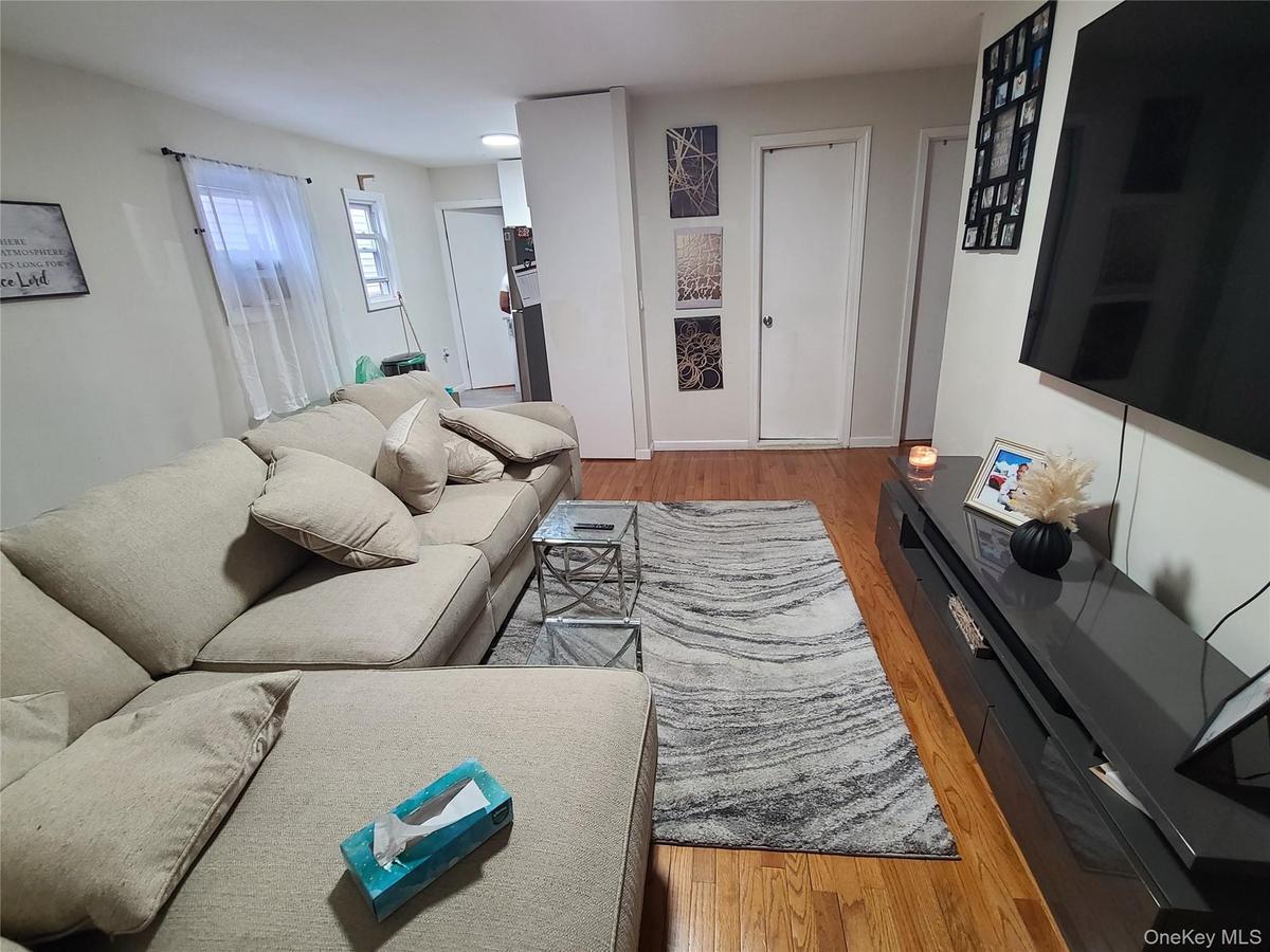 Living room featuring wood finished floors