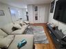 Living room featuring wood finished floors