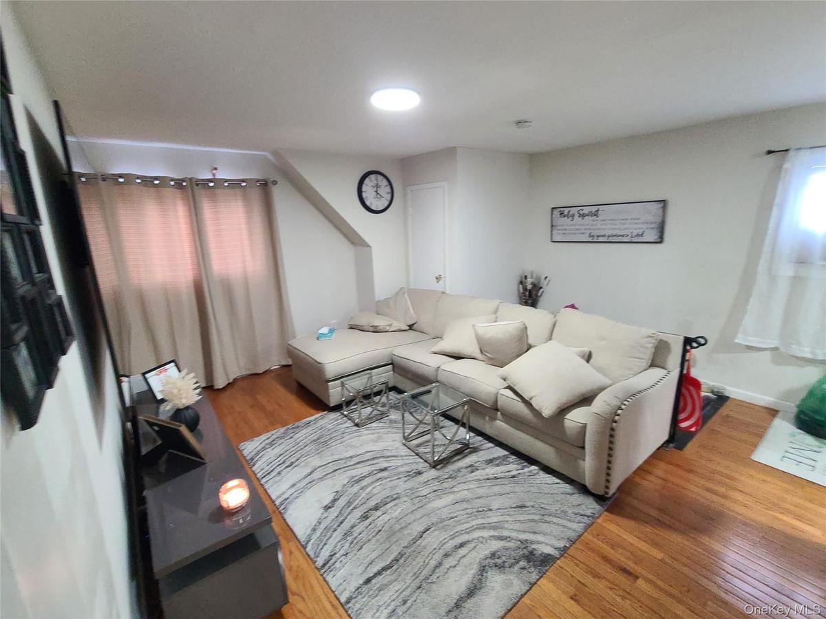 Living room featuring wood finished floors