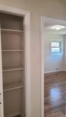Closet featuring visible vents
