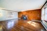 Apartment Living Room with Hardwood Floors and Fire Place