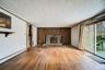 Main House Family Room with Fire Place and Hardwood Floors