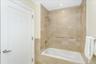 Full bath featuring tiled shower / bath