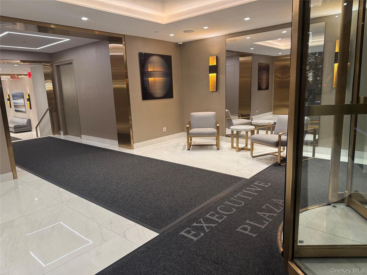 Community lobby featuring recessed lighting
