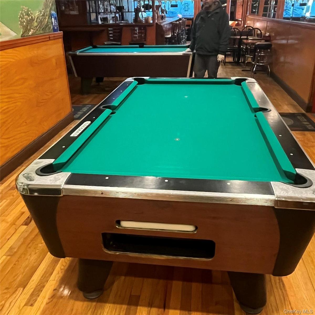 Spacious bar, 2 rented pool tables which includes upkeep