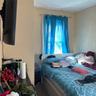 Rear Apt's Primary Bedroom