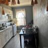 Rear Apt's Recently Renovated Kitchen: new tiles, stove/oven, sink, fridge, cabinets!