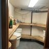 One of many storage spaces in the basement