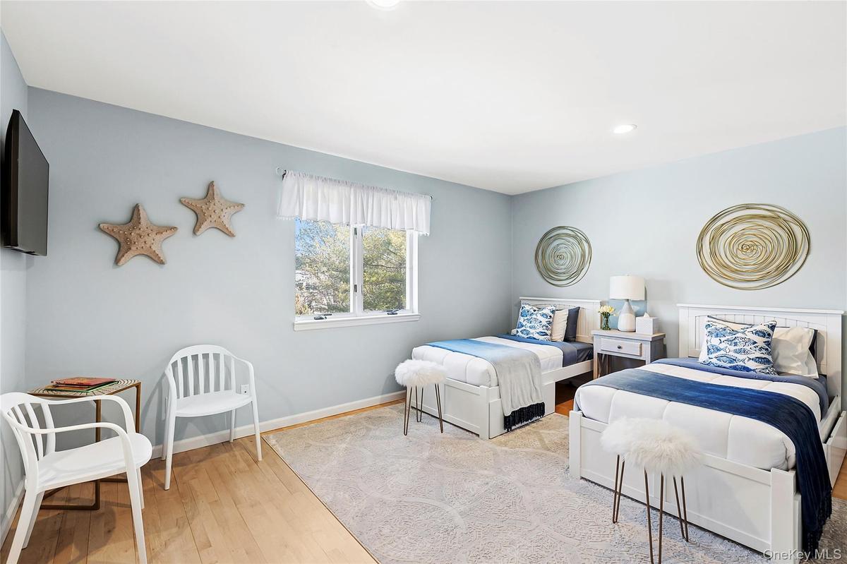 Bedroom featuring light wood-style floors and recessed lighting
