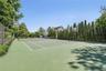 view of tennis court virtually enhanced