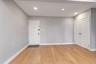Foyer with light wood-type flooring, closet, and recessed lighting