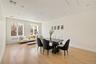 Dining space featuring light wood finished floors, radiator heating unit, and recessed lighting