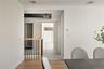 Dining space with light wood-type flooring and baseboards