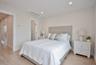 Master Bedroom with light wood finished floors, recessed lighting, and ensuite bath