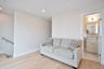 Living room featuring light wood-type flooring and recessed lighting