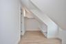 Bonus room featuring light wood-style flooring and baseboards