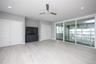 Unfurnished living room with a ceiling fan, light wood-style floors, and recessed lighting
