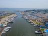 Aerial view of a marina and a large body of water