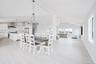 Dining area featuring ceiling fan, high vaulted ceiling, light wood-style floors, and recessed lighting