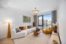 Living room featuring wood finished floors and baseboards