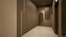 Corridor with elevator, arched walkways, and recessed lighting