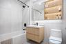 Full bathroom with shower / tub combination and vanity